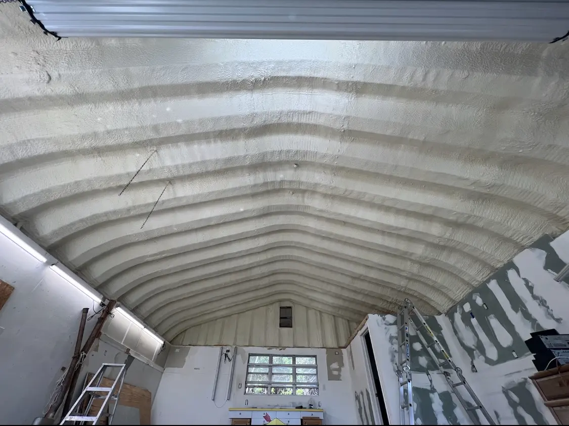 Spray polyurethane foam applied to the underside of a metal roof deck in Flossmoor